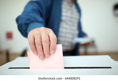 man-casts-his-ballot-he-260nw-644008291