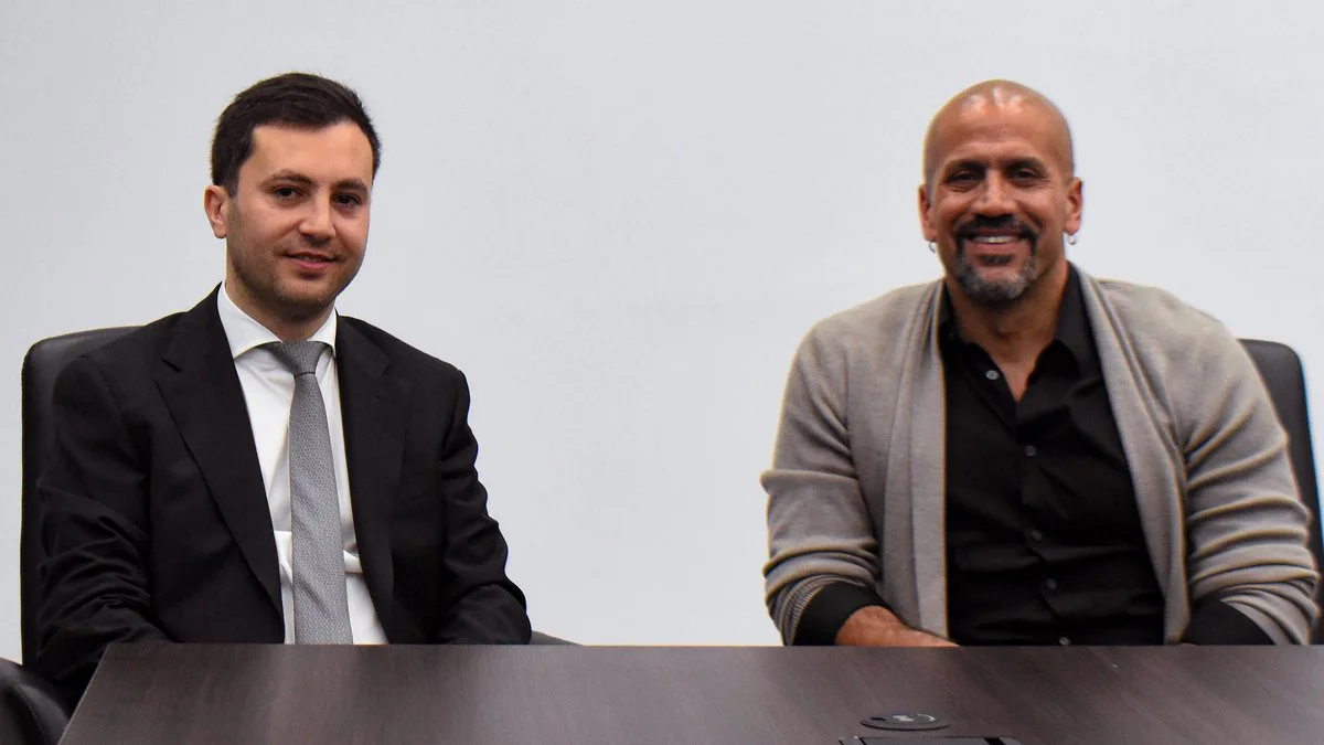 Stefano Di Carlo y Juan Sebastián Verón.