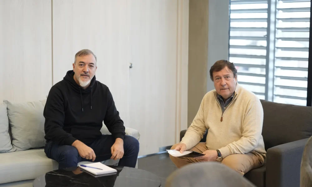Rodolfo Aguiar de ATE, y el gobernador Alberto Weretilneck.