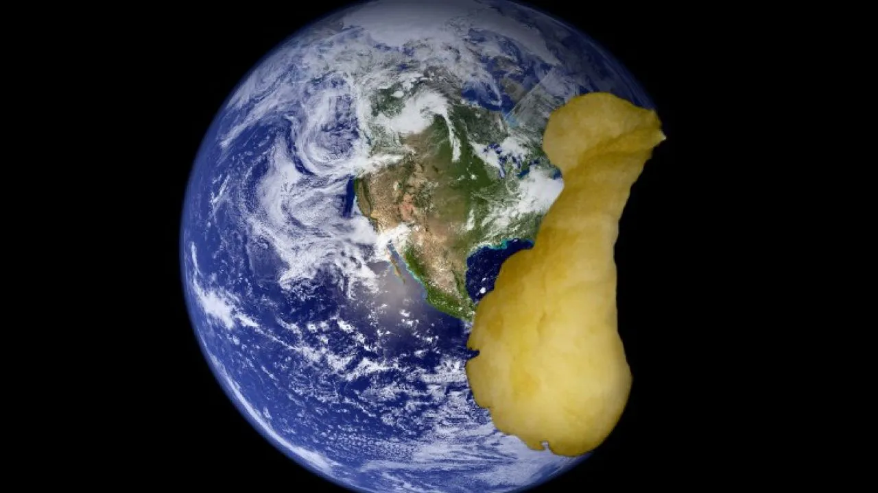 Globo terráqueo con una manzana