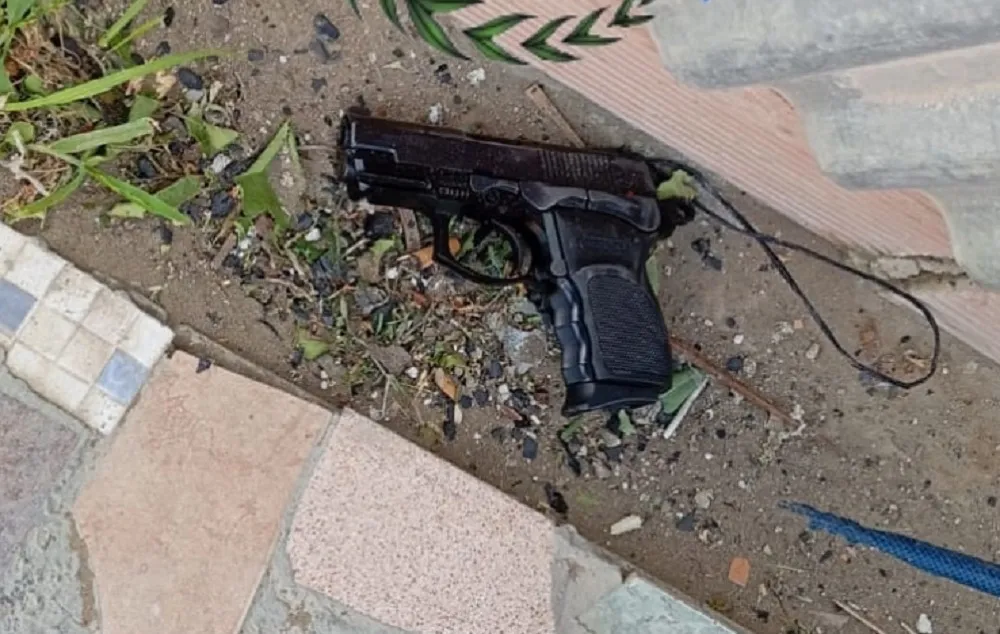 policial arma_11zon